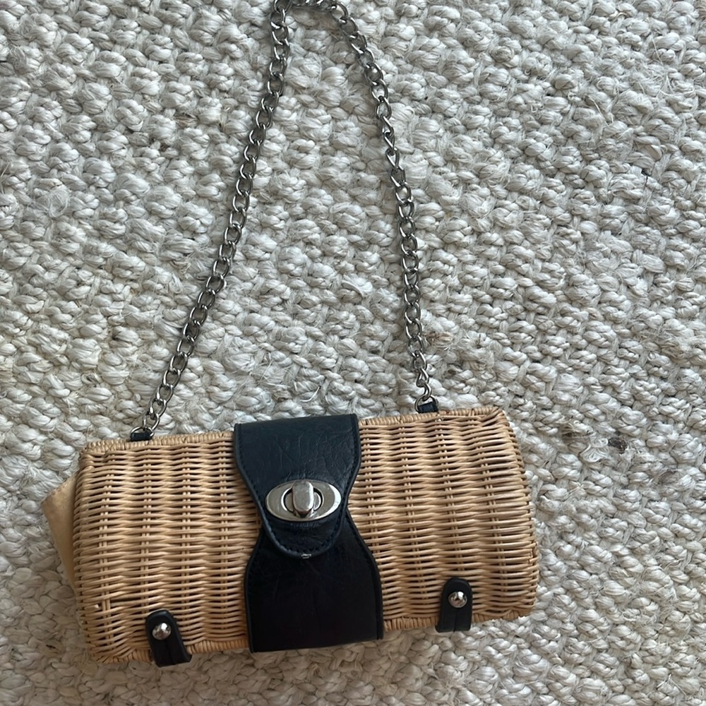Small straw handbag with chain link strap